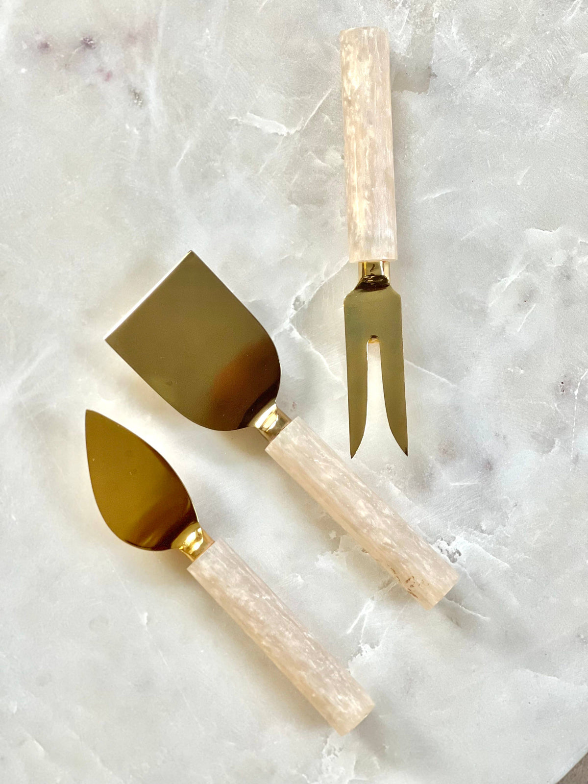 Ivory Resin and Steel Cheese Tools Set
